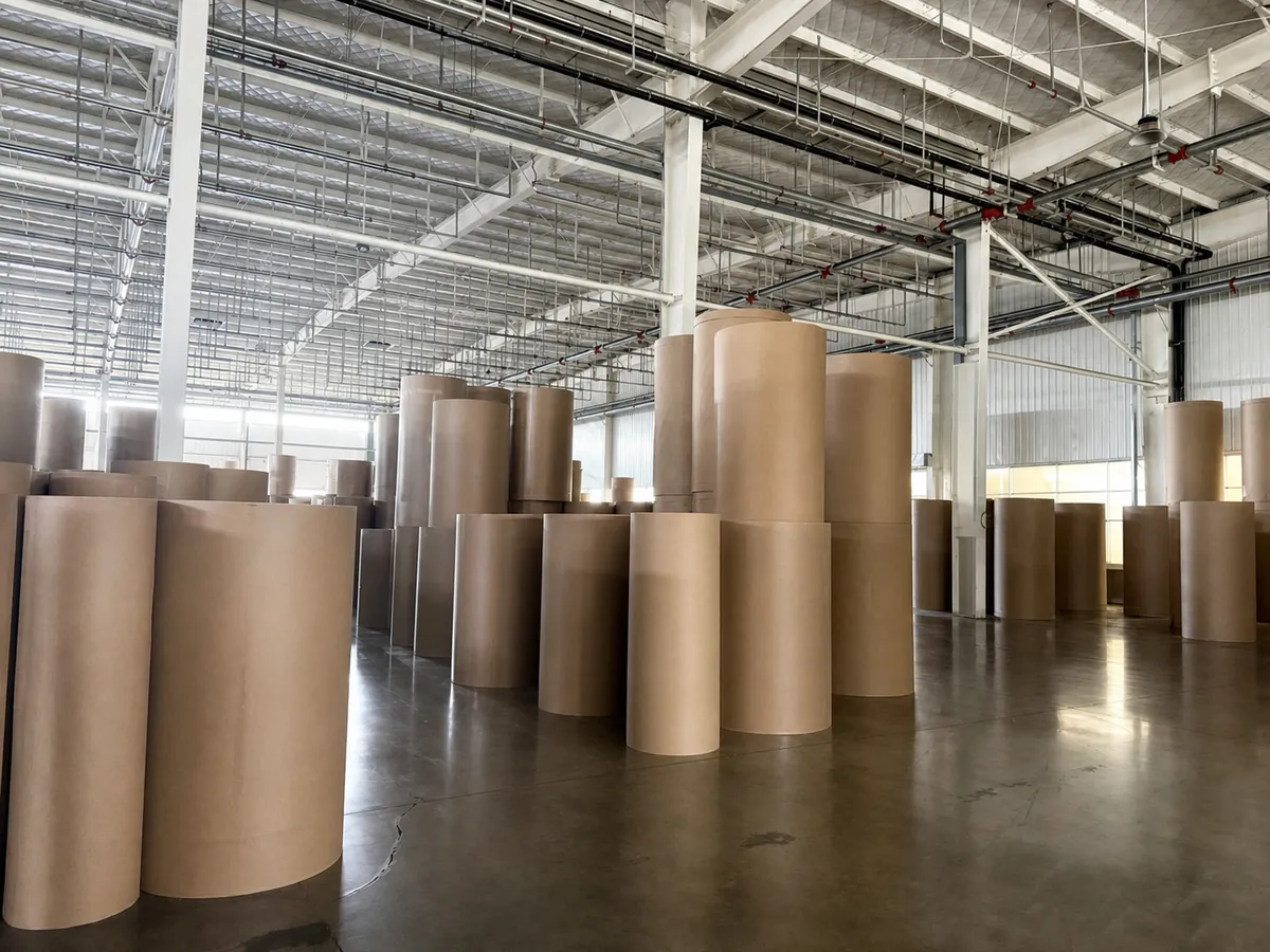 Unbranded raw paper warehouse for corrugated packaging